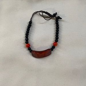red and black adjustable bracelet!!